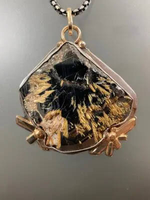 P 2115 Rutile Crystals In Hematite Matrix